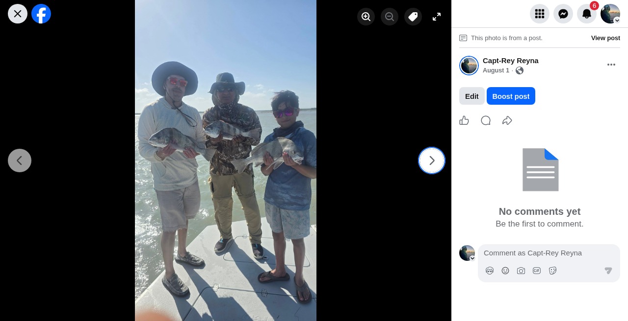Happy clients showing off their catch with Capt. Rey on the bay